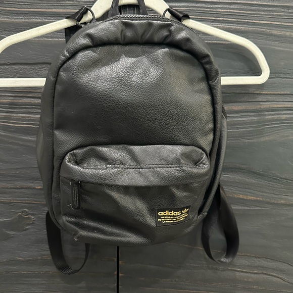adidas Handbags - Adidas Black Leather Backpack (Mini)